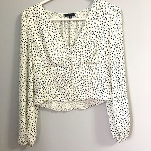 White and black polka dots top